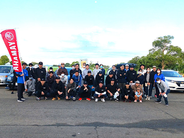 Group photo taken during cleanup activities the day after the fireworks festival