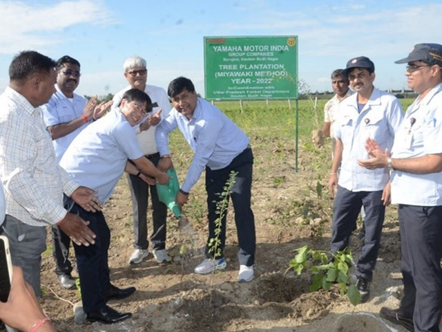 Photo taken during the planting of 21,000 trees on land surrounding the factory as part of CSR activities