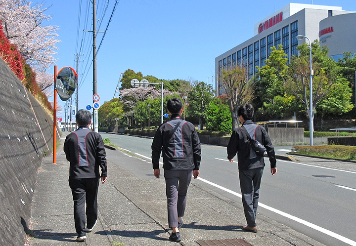 Photo: Employees walking away