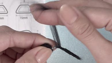 Wrap a black sliver around the wire and the join and poke to fix.