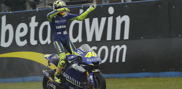 V. Rossi puts on a show after taking the checkered at the British GP