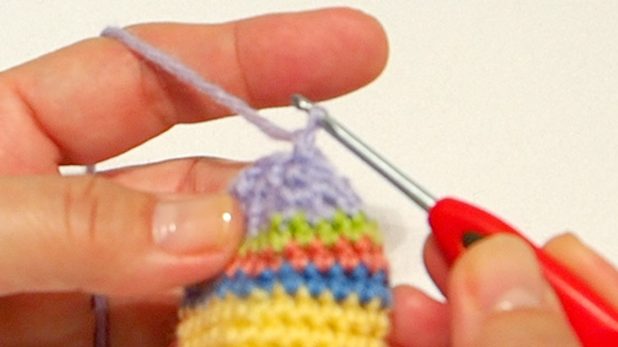 Knit a chain stitch and pull the wool completely through.