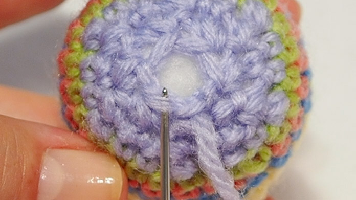 Pick up the next-but-one stitch to complete the circle.