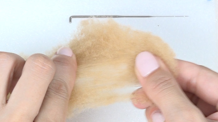 The wool fibres are short so it is easy to separate and shape.