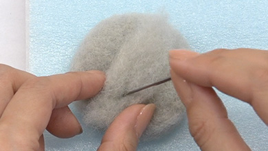 Add felt and poke to make the protrusions  in the middle