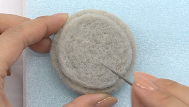 Add an 0.3cm thick, 5.1cm diameter circle to the back