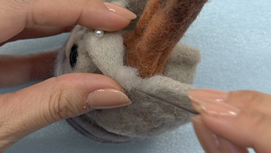 Add felt to the join and shape and poke to fix