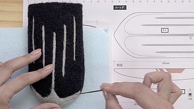 Add felt to create the indentations for the tip of the lines.