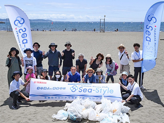 Group photo taken at the beach cleanup event for members of Yamaha Marine Club Sea-Style