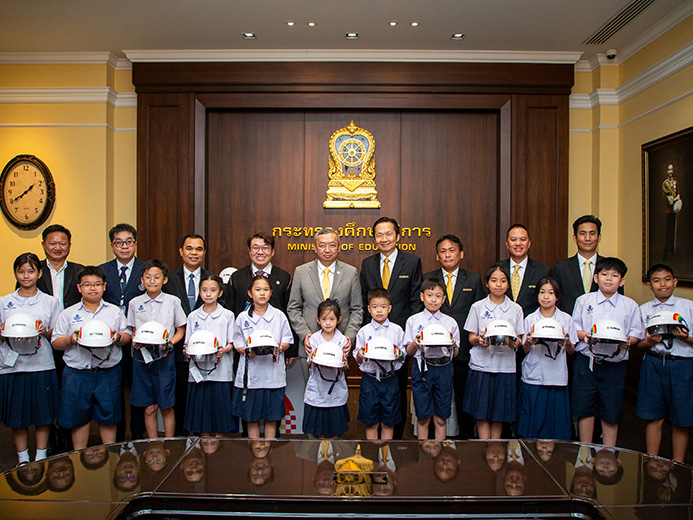 Delivering Junior Helmets to Students
